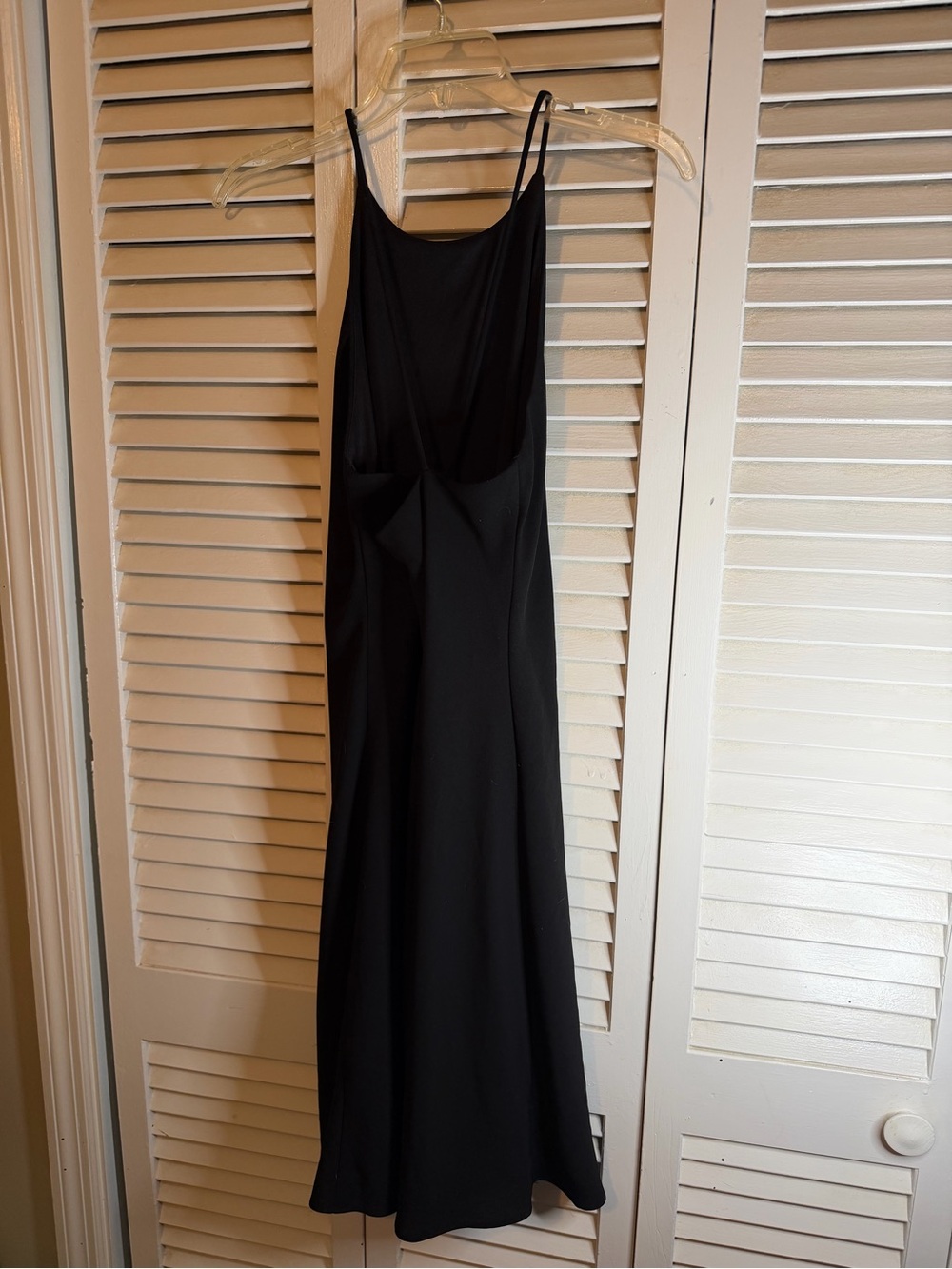 Black sleeveless slip dress